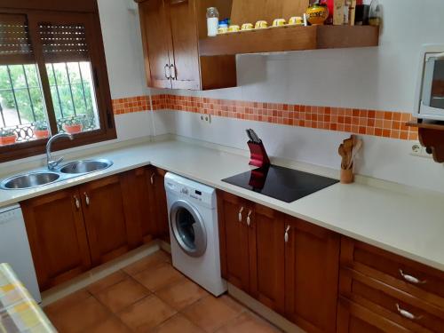 O bucătărie sau chicinetă la Casa del Lavadero