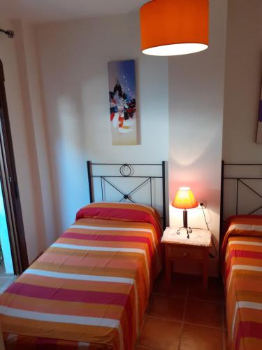 Ένα ή περισσότερα κρεβάτια σε δωμάτιο στο Casa del Lavadero