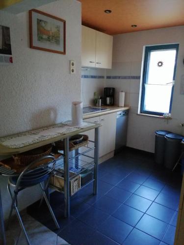 Kuchyň nebo kuchyňský kout v ubytování Ferienhaus Pauline am See