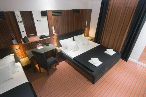 Una cama o camas en una habitación de Hotel Viva