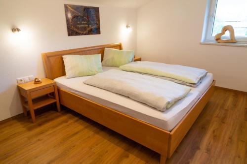 Ένα ή περισσότερα κρεβάτια σε δωμάτιο στο Vorderkreuzsaalgut