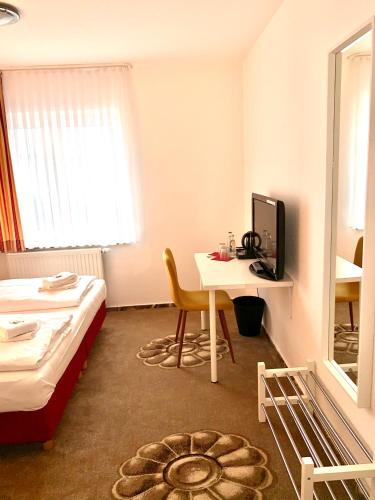 Ένα ή περισσότερα κρεβάτια σε δωμάτιο στο DUA Hotel