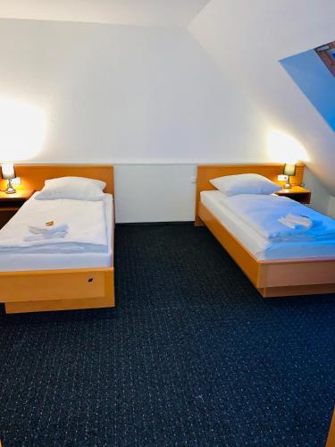 Ένα ή περισσότερα κρεβάτια σε δωμάτιο στο DUA Hotel