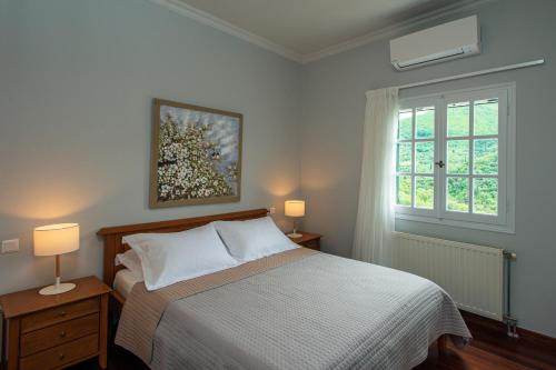Postel nebo postele na pokoji v ubytování Villa Corfu Melody