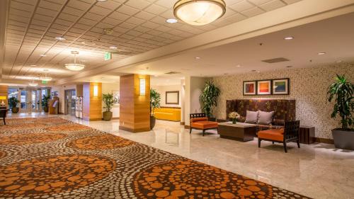 a lobby of a hotel with couches and a couch at Holiday Inn San Francisco - Golden Gateway, an IHG Hotel with no Resort Fee in San Francisco