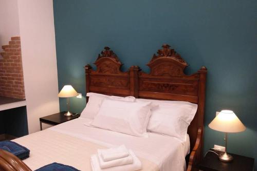 Casa Ferdinando apartment tesisinde bir odada yatak veya yataklar
