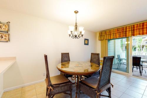 a dining room with a table and chairs at Sea Colony - 1804 Doubles in Bethany Beach