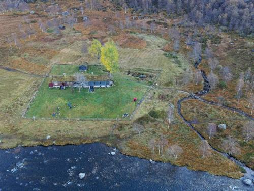 an aerial view of a large house on a field at 27 person holiday home in dyrdal in Frafjord