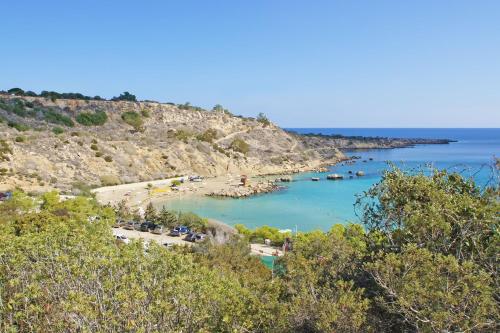 a view of a beach with boats in the water at Villa Medusa in Protaras