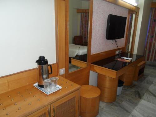 TV a/nebo společenská místnost v ubytování Hotel PLR Grand