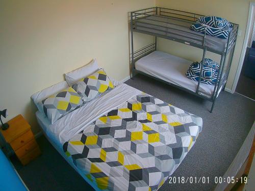 Postel nebo postele na pokoji v ubytování Turn-in Motel