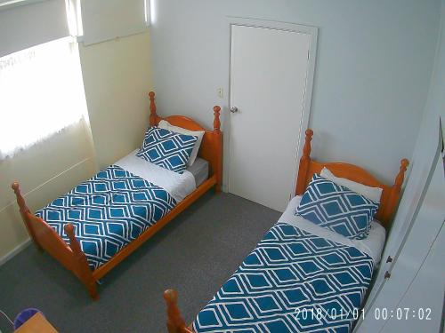Postel nebo postele na pokoji v ubytování Turn-in Motel