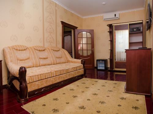 Postel nebo postele na pokoji v ubytování Naftusya Hotel