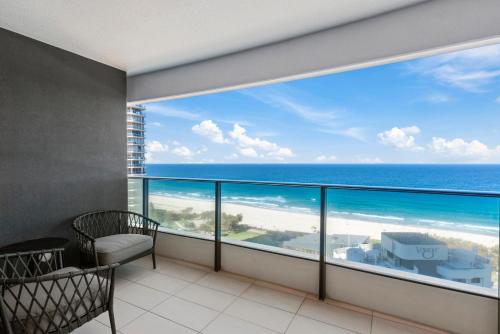 a balcony with a view of the ocean at Oracle Resort Broadbeach - gclr in Gold Coast