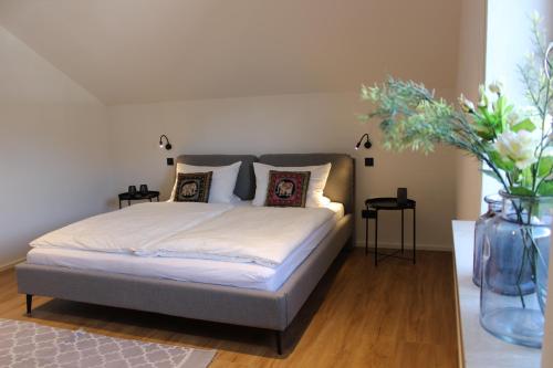 Postel nebo postele na pokoji v ubytování Ferienwohnung Oberschopper