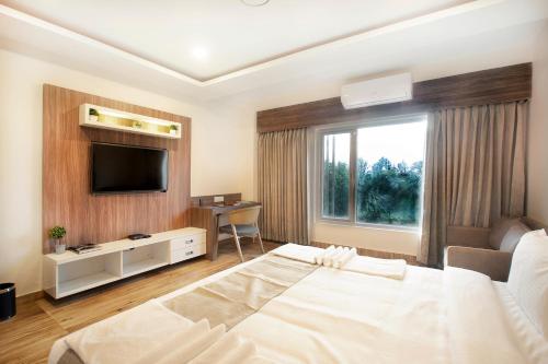 Letto o letti in una camera di ABM Boutique Hotel by Purple Cloud