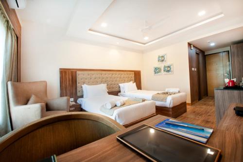 Letto o letti in una camera di ABM Boutique Hotel by Purple Cloud