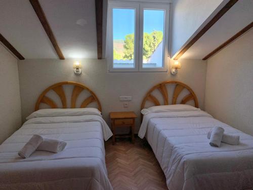 Postel nebo postele na pokoji v ubytování Hotel Rural Sierra De Segura