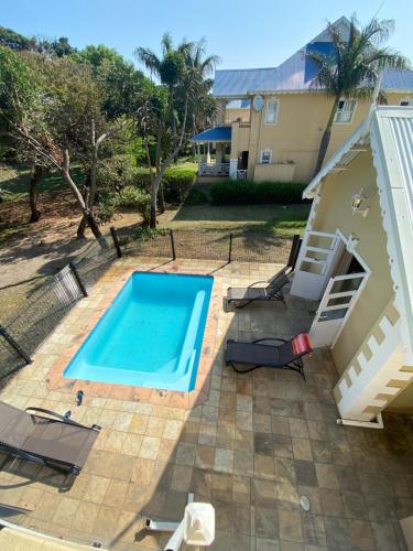an overhead view of a swimming pool in a yard at Barbados 13, Caribbean Estate - PRIVATE POOL!! in Port Edward