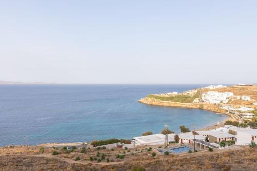 an aerial view of a beach and the ocean at Sea Wind Apartments in Agios Stefanos