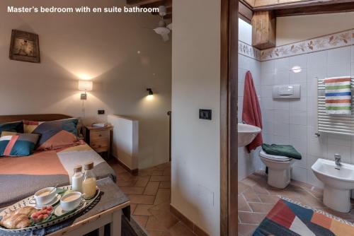 Katil atau katil-katil dalam bilik di Agriturismo Rigone in Chianti