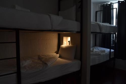 Cama o camas de una habitación en 91 Loop Boutique Hostel