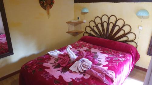 Ένα ή περισσότερα κρεβάτια σε δωμάτιο στο Moulin de Saint Cricq