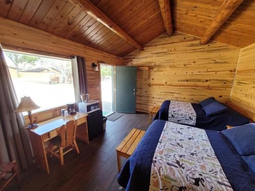Ένα ή περισσότερα κρεβάτια σε δωμάτιο στο Yellowstone Valley Inn