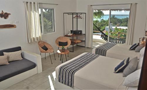 Χώρος καθιστικού στο Hotel Aires Bacalar