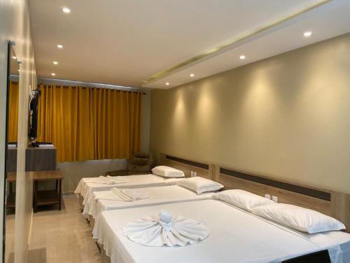 Кровать или кровати в номере Hotel Sandis