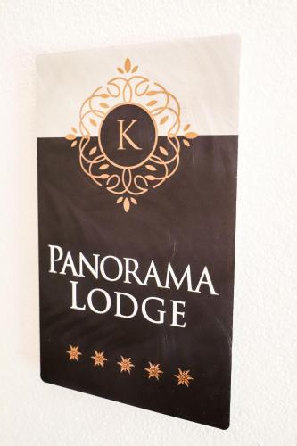 a sign for a pantomime lodge at Klausenstein Gutshof Hollersbach in Hollersbach im Pinzgau