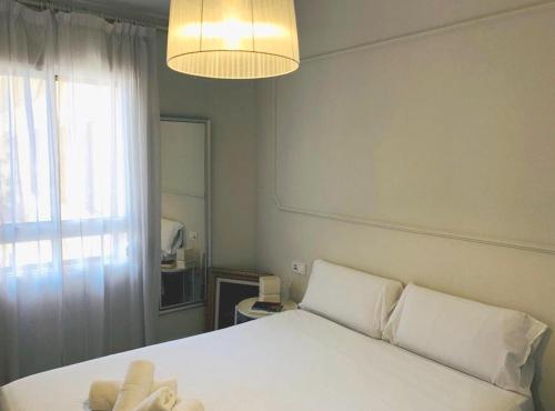 Posteľ alebo postele v izbe v ubytovaní Apartamento a 50 metros de la playa malagueta con vistas al mar
