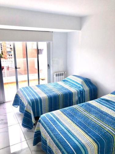 Postel nebo postele na pokoji v ubytování FOREST 7º