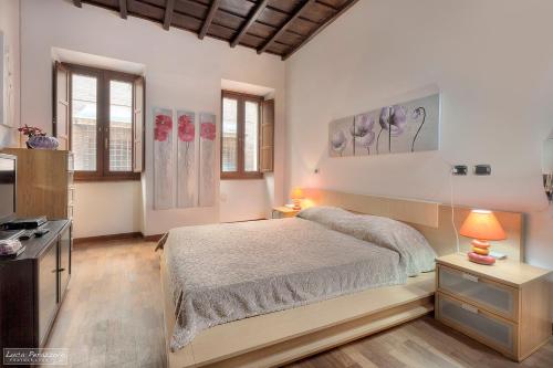 Ένα ή περισσότερα κρεβάτια σε δωμάτιο στο Casa Funari