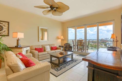 a living room with a couch and a table at 801 Harborview Grande in Clearwater Beach