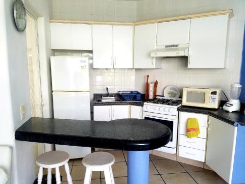Dapur atau dapur kecil di Hacienda Real Suits Ixtapa