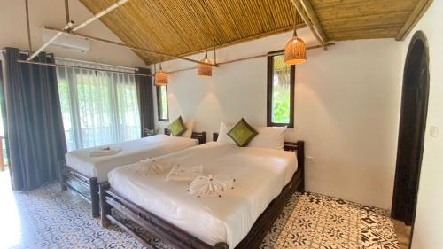 Tempat tidur dalam kamar di Ninh Binh Retreat