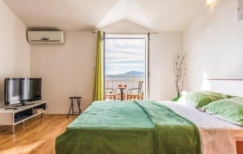 Postel nebo postele na pokoji v ubytování Apartments Mateljak