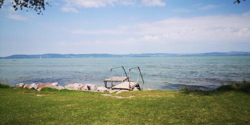 a playground in the middle of a body of water at LAKE MOMENTS - Emerald Penthouse in Balatonszemes
