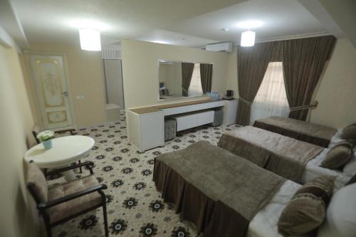 Ένα ή περισσότερα κρεβάτια σε δωμάτιο στο Sumaya Hotel