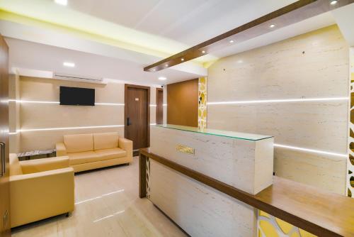 Телевизор и/или развлекательный центр в Oxford Hotel Powai