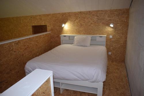 Кровать или кровати в номере Gîte Esprit loft