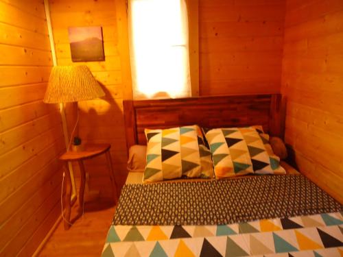 Postel nebo postele na pokoji v ubytování Chalet des Remparts