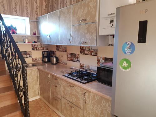 Η κουζίνα ή μικρή κουζίνα στο Fontanka Dom