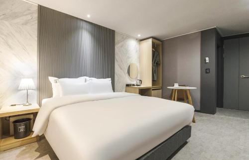 Katil atau katil-katil dalam bilik di JJ Hotel