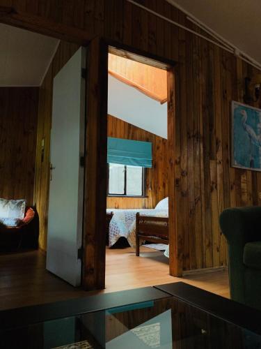 Postel nebo postele na pokoji v ubytování Cabaña Las Patagüas - Coñaripe