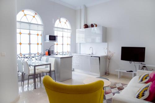 Kuchyňa alebo kuchynka v ubytovaní Hispalis Casa Palacio Apartment