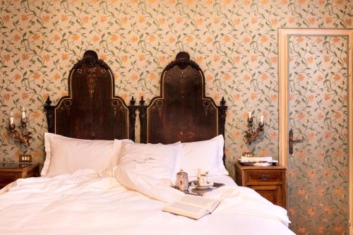 Katil atau katil-katil dalam bilik di Hotel Flora