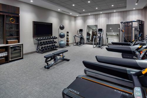 a fitness room with treadmills and a gym at Holiday Inn Express - Boston Logan Airport - Revere by IHG in Revere