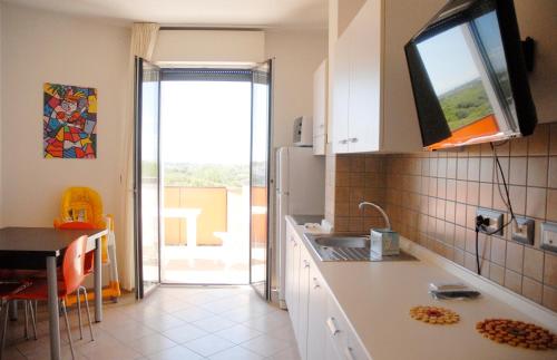 TV a/nebo společenská místnost v ubytování Tropicana Residence